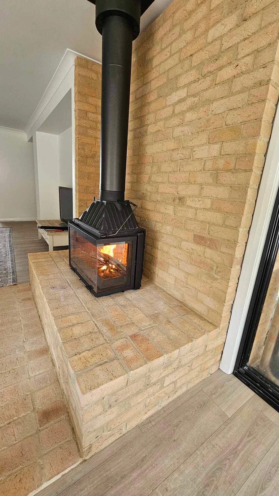 Internal feature brick wall with fireplace